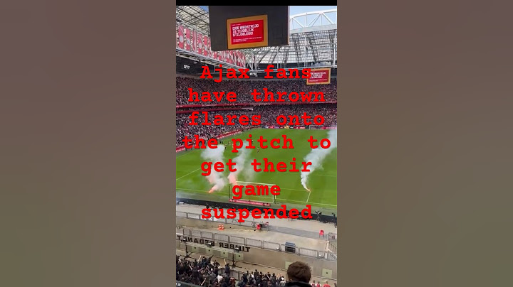 Ajax Amsterdam vs Feyenoord Rotterdam flares onto the pitch game suspended #hooligan #police #ajax