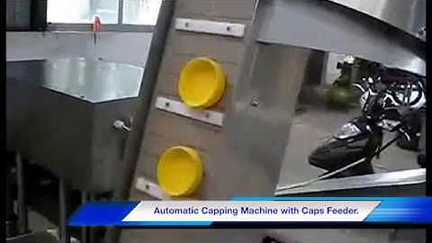 AUTOMATIC CAPPING MACHINE WITH CAPS FEEDER