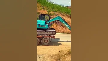 Cara Yang Cerdas Menurunkan Alat Berat Dari Atas Truk Shorts 