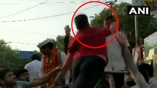 Watch: Delhi CM Arvind Kejriwal slapped during roadshow in Moti Nagar