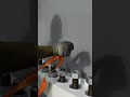 The process of tightening the base nut- Good tools and machinery make work easy