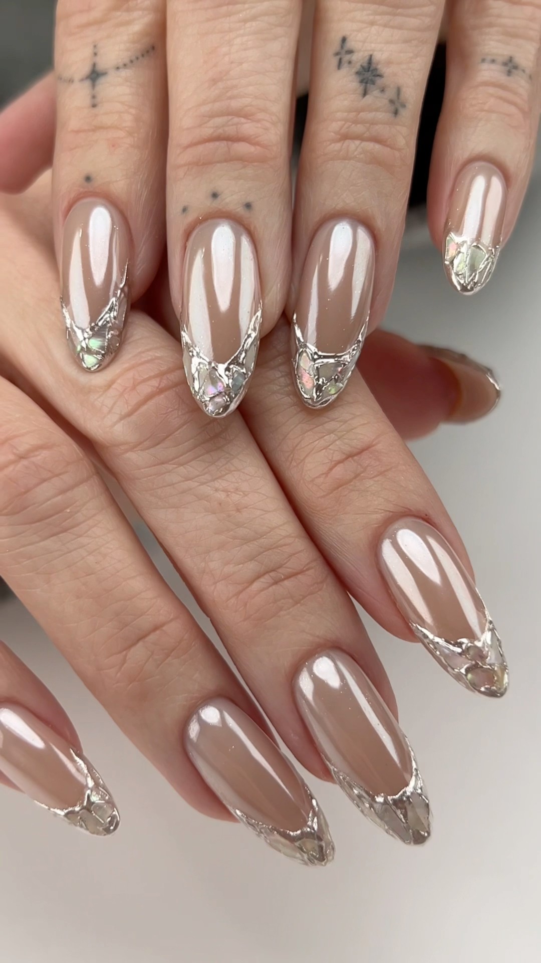 Chrome and sculpted nail design