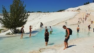 Pamukkale thermal travertine pools in Denizli, Turkey - Turkiye (HD HQ view) denizlihotel.com