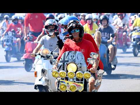 Vespa enthusiasts celebrate iconic scooter's 80th anniversary in Rome
