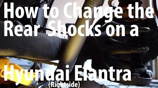 DIY How to change the rear shocks on a Hyundai Elantra - KYB (Rightside with commentary)