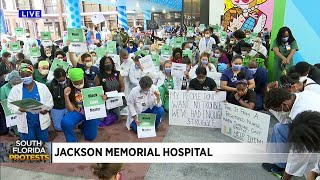 Miami hospital workers take a knee to support Black Lives Matter movement
