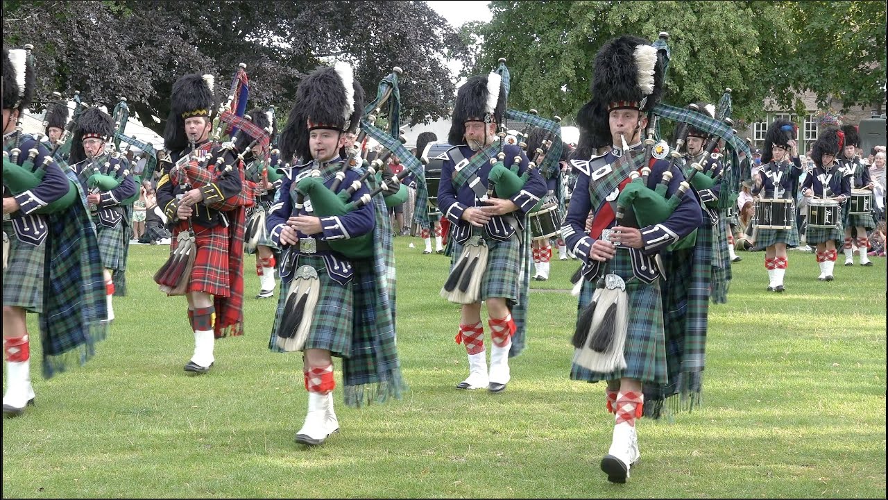 Ballater Pipe Band playing Kilworth Hills during Beating Retreat after 2023 Ballater Highland Games