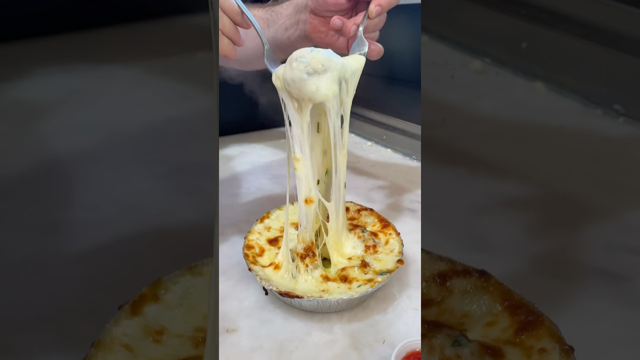 EXTRA CHEESY GARLIC KNOTS in the making from East Village Pizza in NYC! 🧀🍕🔥🤤 #DEVOURPOWER