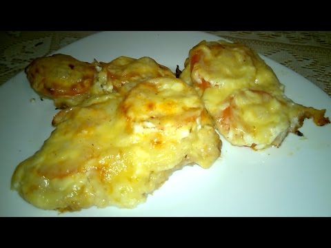 Video: How To Cook Pork With Tomatoes And Cheese In The Oven