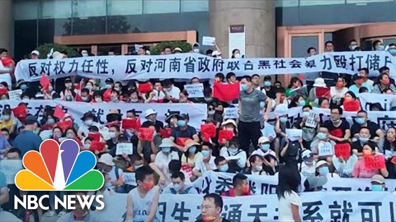 Chinese Security Personnel Clash With Protesters Outside Bank