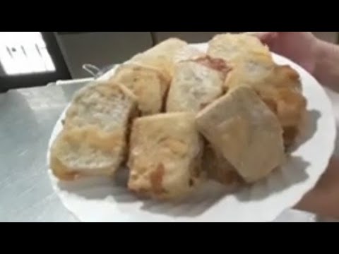 Cooking chinese dessert fried tikoy with yam and ube