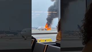 Plane Engulfed In Flames On Runway