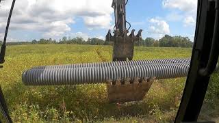 Cutting In A Road Through A Bean Field