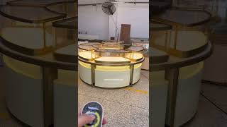 Customized round jewelry display cabinet with remote control for light adjustment #jewelryshowcase