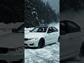 BMW drifts in snowy mountains