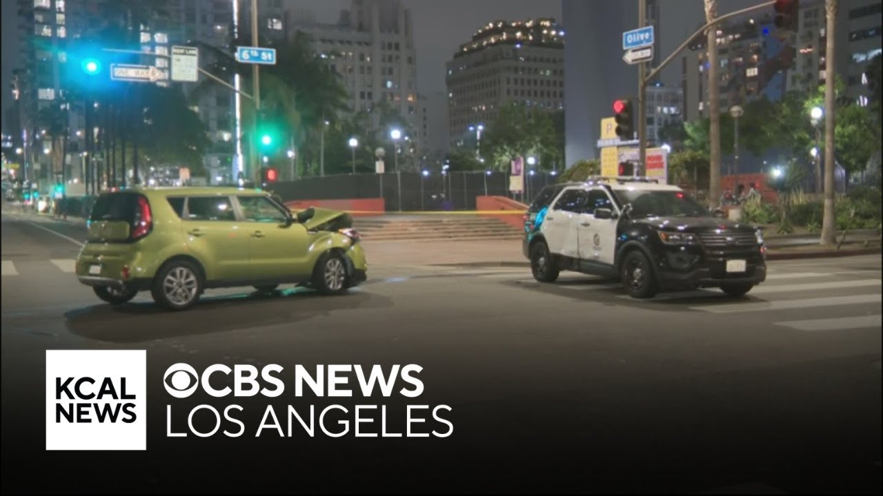 Driver allegedly runs red light and crashes into LAPD cruiser - YouTube
