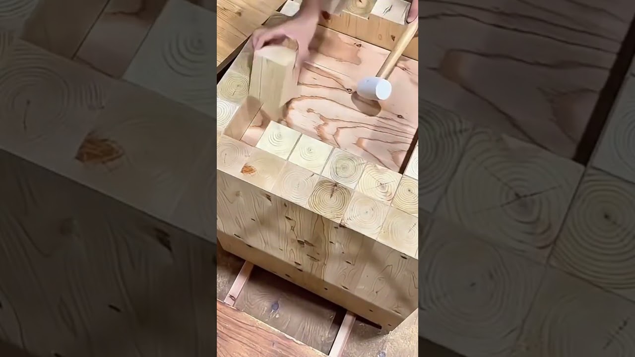 Arrange the wooden blocks that have been cut into squares in their storage place using a hammer