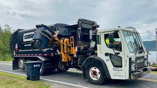 Casella Waste Garbage Truck Packing Trash By The Lake