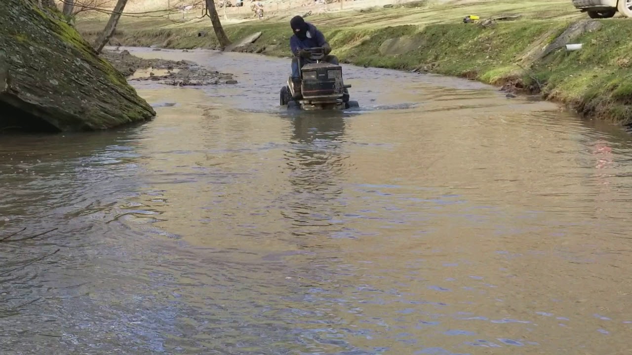The Crapsman mud mower goes for a swim