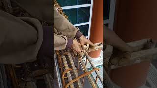 Manual Rebar Tying on High-Rise Construction | Skilled Ironworker at Work