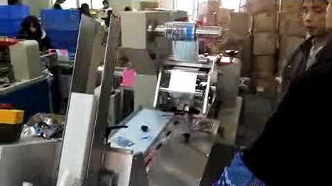 flow wrapper with friction feeder