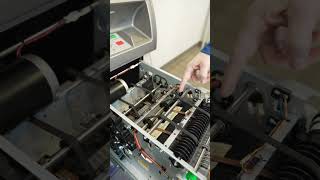 Removing a bill jam from a Hyosung Dispenser
