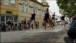 Ballet in a contemporary style danced in the street.