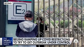 Beijing continues lockdown