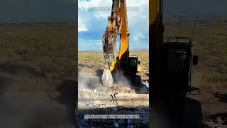 Excavator smashes concrete with a heavy weight—demolition power with key safety tips!