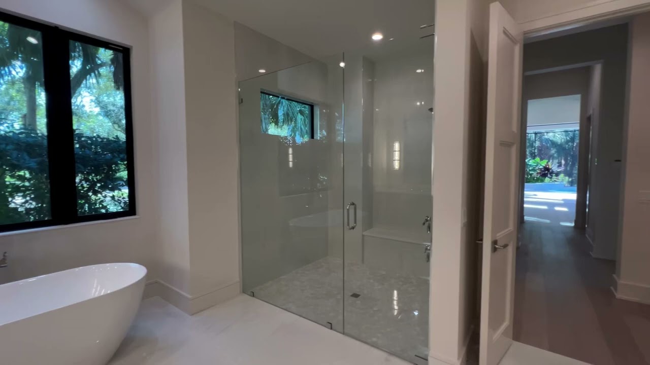 Step Inside This Stunning Newly Built Home in West Bay Club!