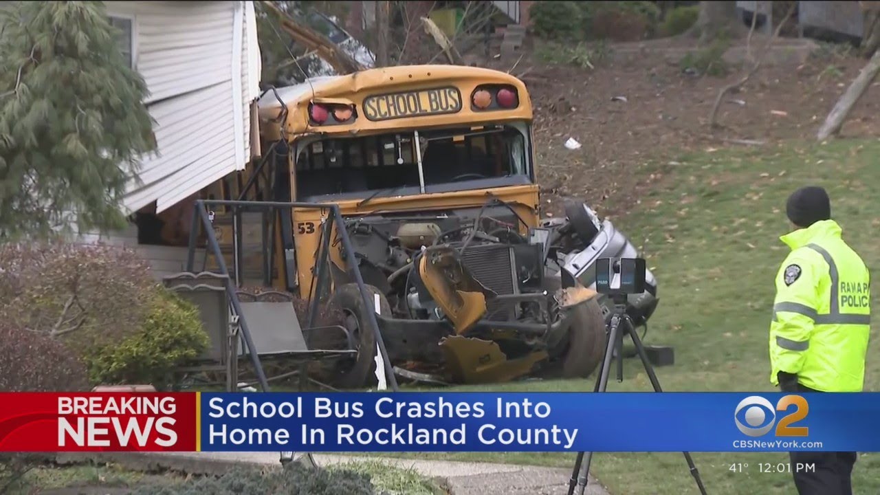 Bus packed with elementary school students crashes into house - YouTube