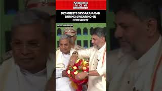 Karnataka Cmdesignate Dk Shivakumar Greets Siddaramaiah During Swearingin Ceremony shorts