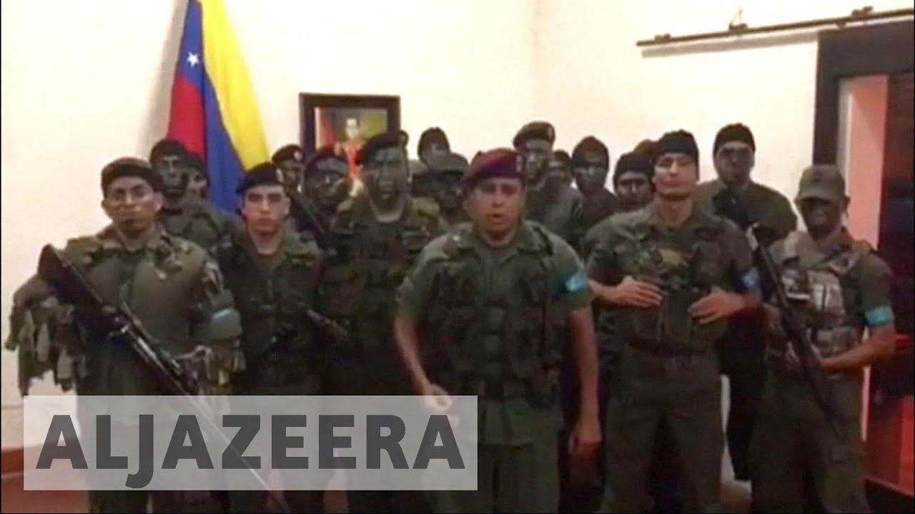 فنزويلا تلاحق عشرة مشتبه بهم في الهجوم على قاعدة فالنسيا العسكرية