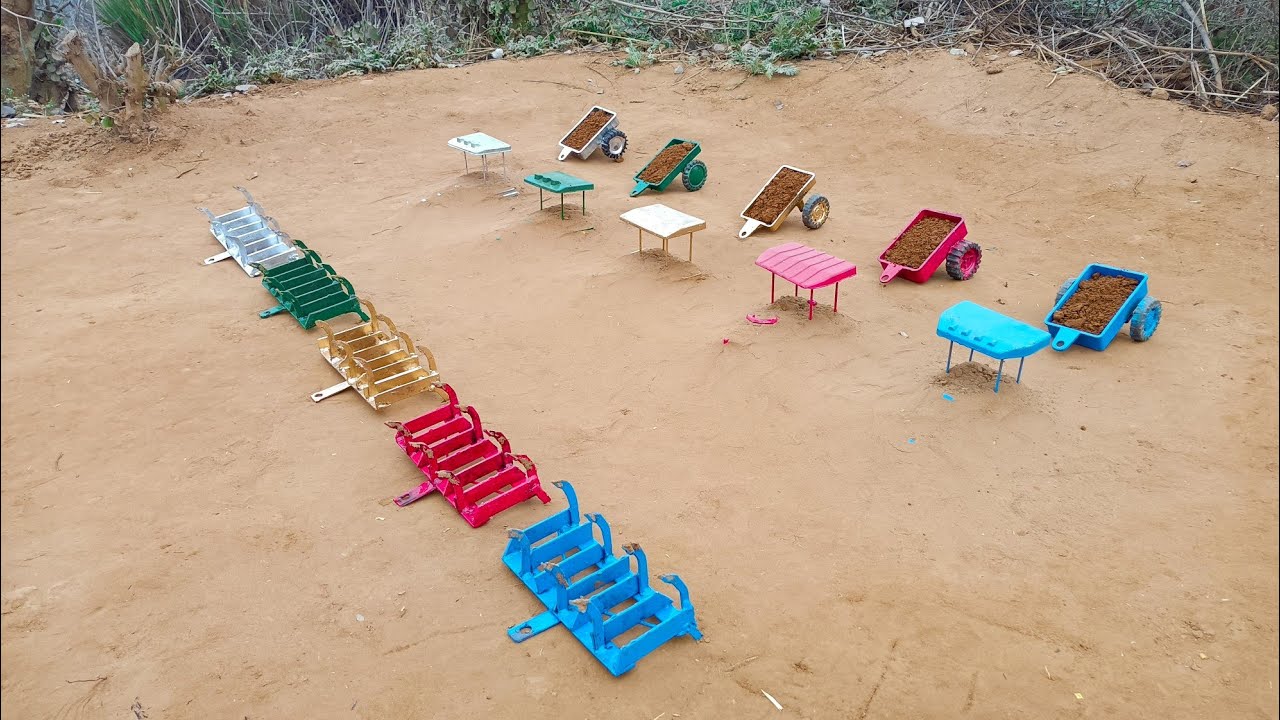 After filling the trolley with soil, the tractor got buried in the mud and the tiller overturned