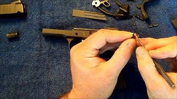 1911:  Fixing a magizine that won