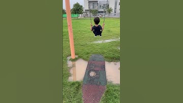 Swinging in rain 💦 #musaandfatmire #youtube #youtubeshorts #viralreels #viralshorts #swings #fypシ