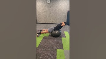 Prone back extension over exercise ball