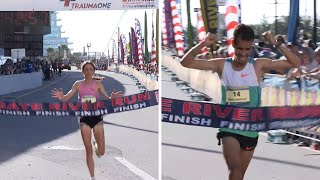 Runners cross the finish line at the 49th Gate River Run
