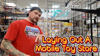 Laying Out A Mobile Toy Store...While Continuing To Process Toys!