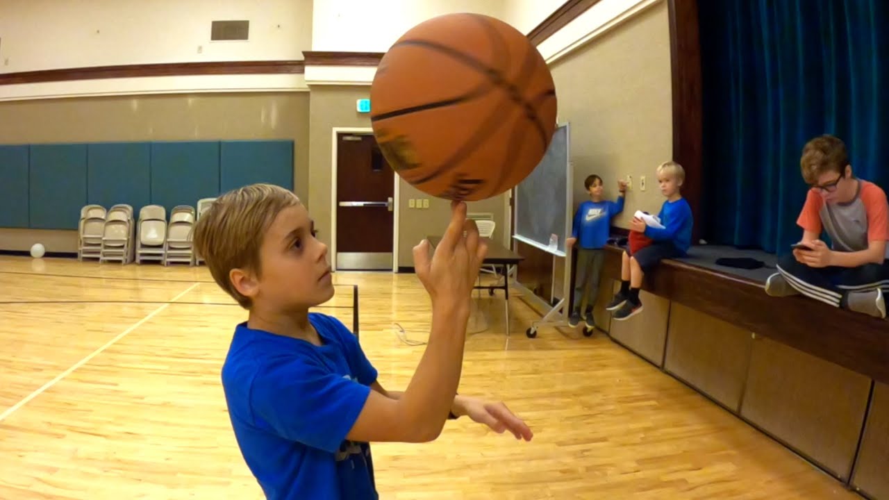 Spinning a basketball and blowing bubbles in slow motion YouTube