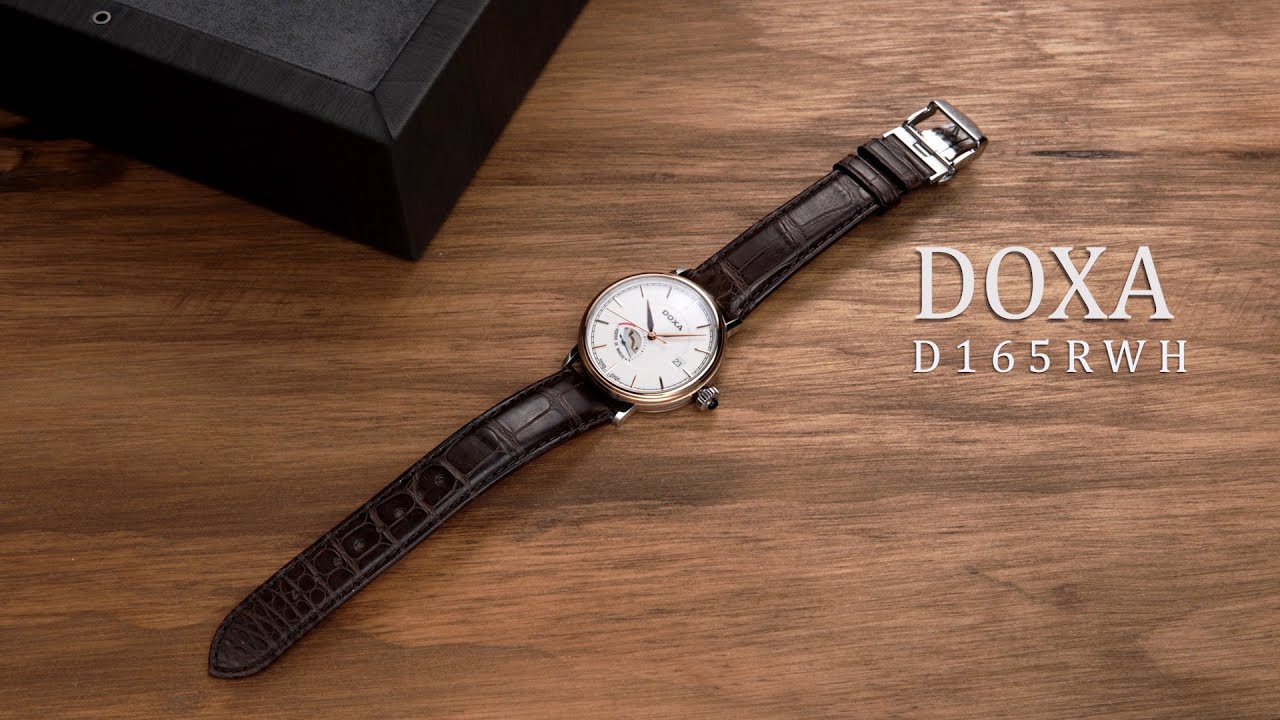 Review đồng hồ Doxa D165RWH vàng 18K nguyên khối.