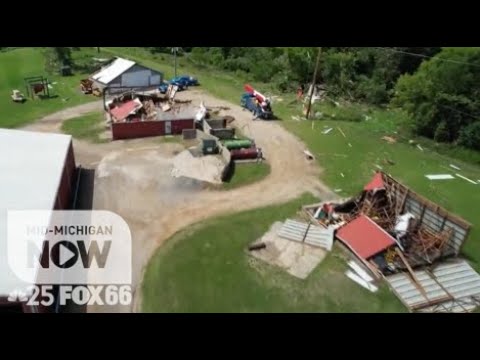 Officials say at least 1 tornado hit Michigan city, causing major damage