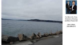 2445 DAY ISLAND BLVD W, UNIVERSITY PLACE, WA Presented by Mark & Mark.