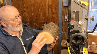 Richard Raffan cutting a split firewood log into woodturning blanks