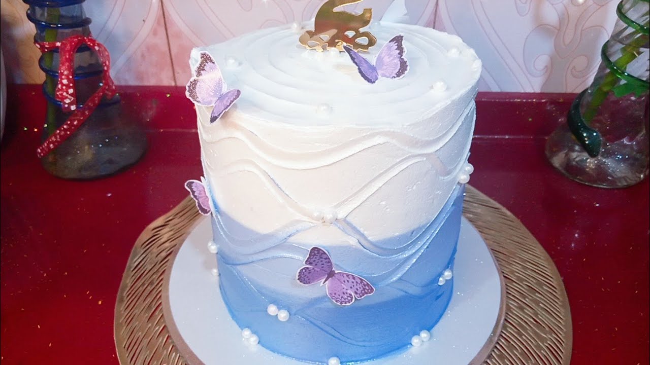 طريقة  تزين كيكه الدبل العاليه قياس 20 وطريقه استخراج لون بنفسجي مع طريقة  تموج الخطوط علئ كريمه
