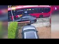 BMW driver mounts pavement and tries to smash through lamppost