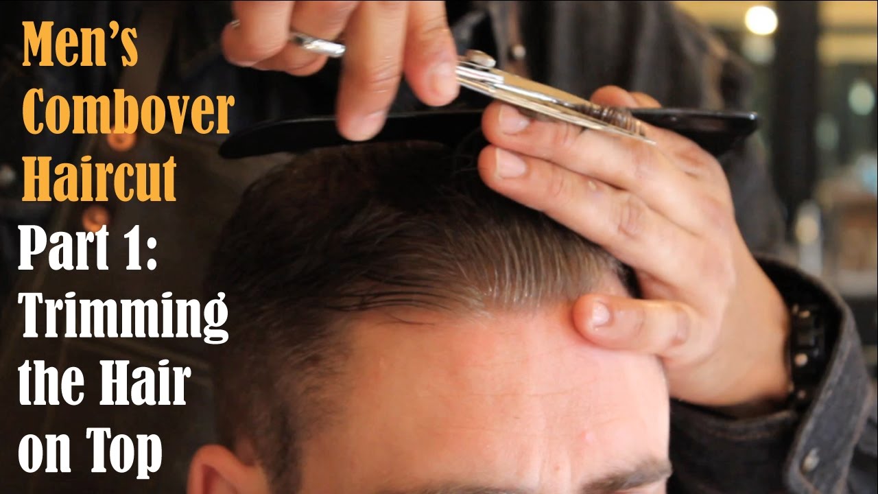 cutting top of men's hair with scissors