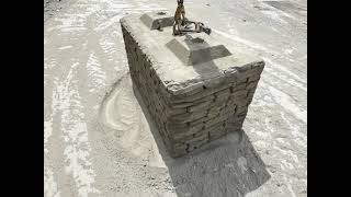 INTERLOCKING STACKED STONE TEXTURED BLOCK