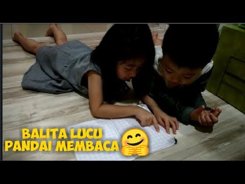 Kakak ajarin adik membaca