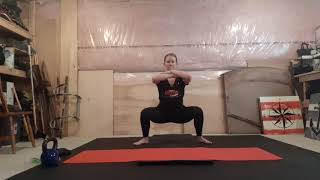 Sumo squat with pause at bottom